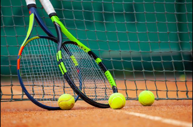 tennis racquet and ball