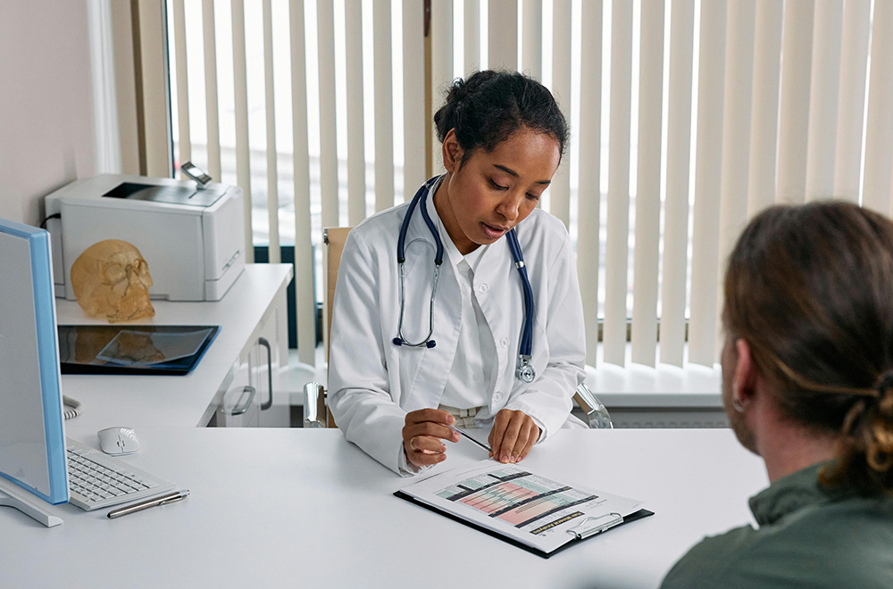 doctor monitoring patients medication